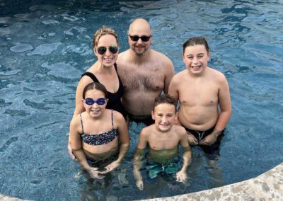 JMD Pools Ottawa customers - Happy family in the pool